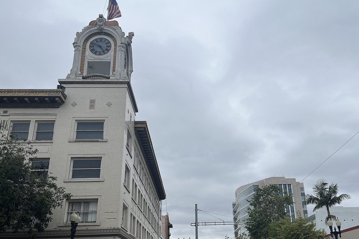 Historic downtown Santa Ana, California, with a white building topped by a clock tower