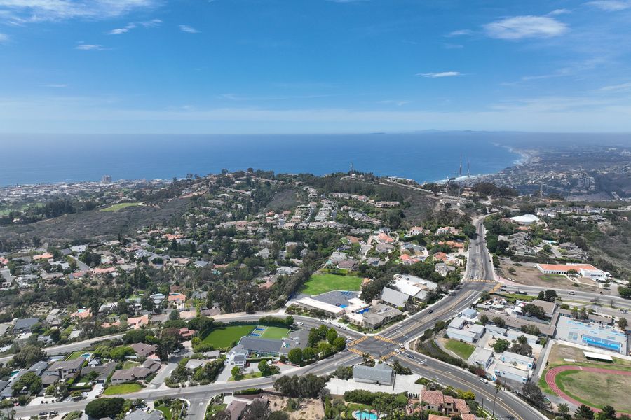 Aerial view of an Orange County neighborhood with the coast in the distance