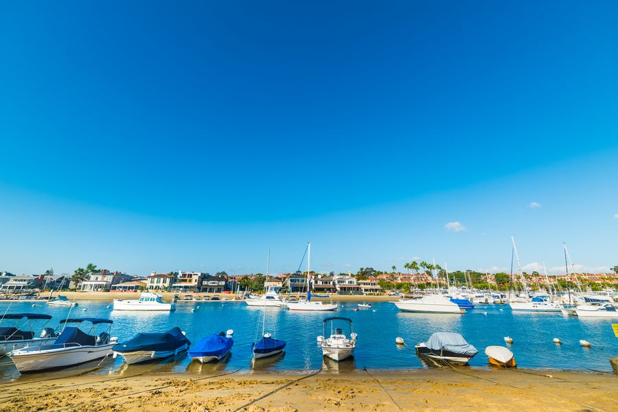 Boats along the shore of Balboa Island in Newport Beach